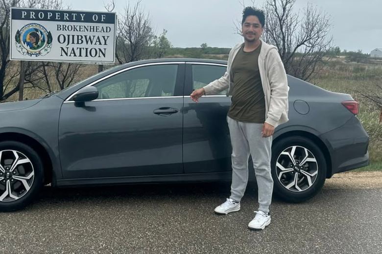 Trevor with his Kia Forte